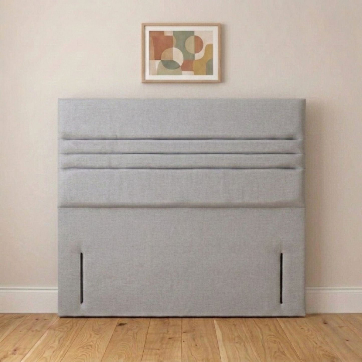Cream horizontal panel headboard angled view showing wide padded panels