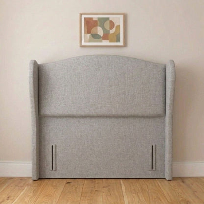 Cream winged headboard angled view showing wraparound side panels