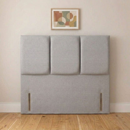 Trinity cream headboard angled view showing three-panel design