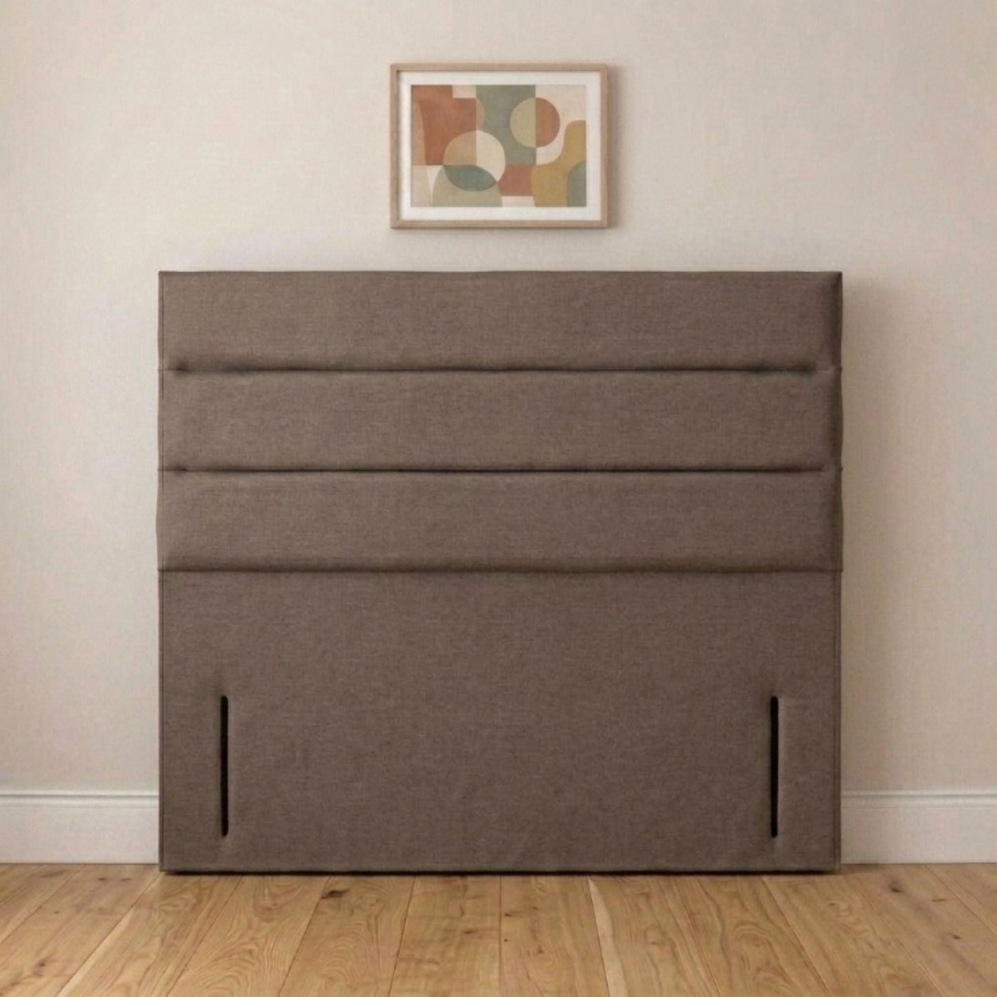 Linear panel headboard fixed to a divan base