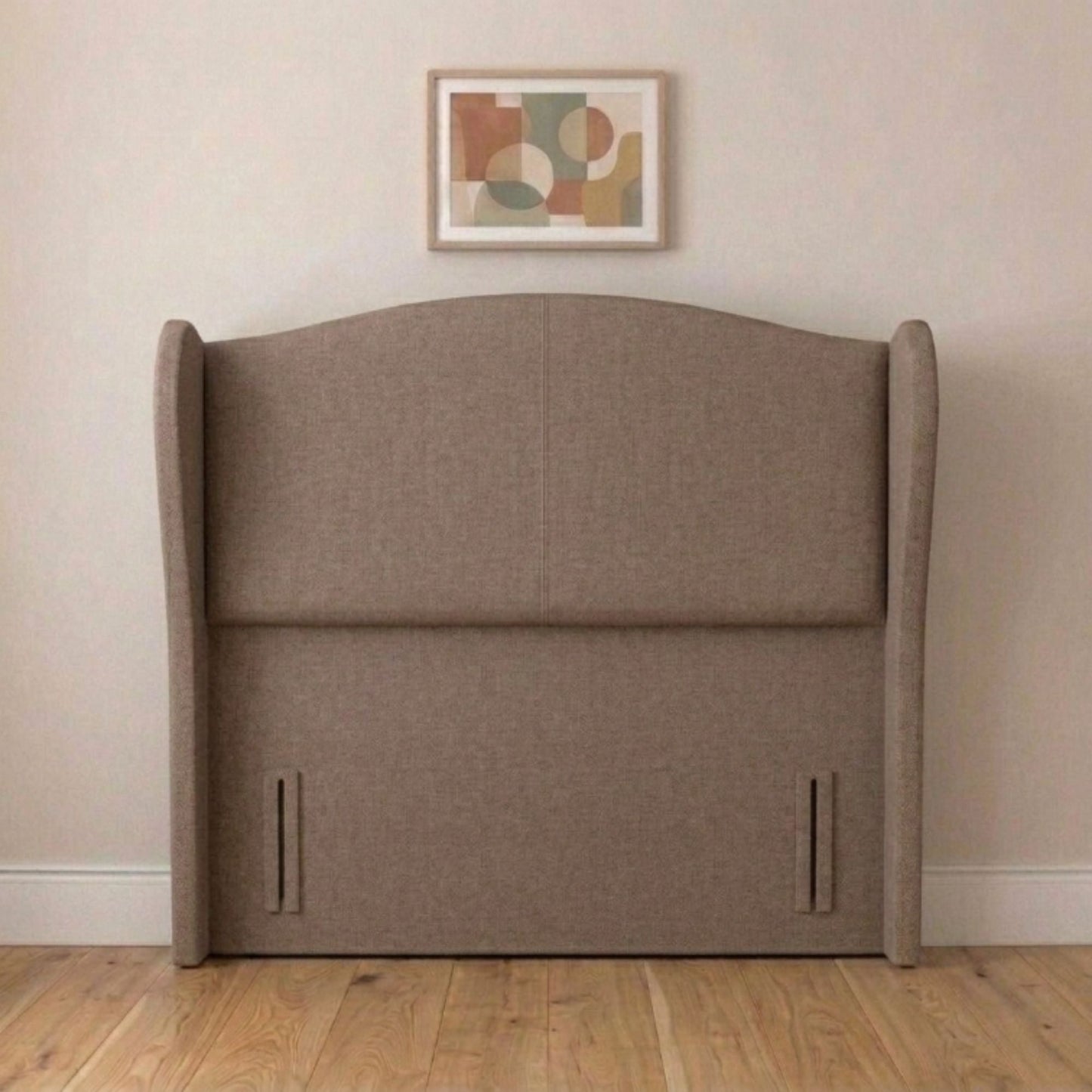 Modern wingback headboard fixed to a divan base