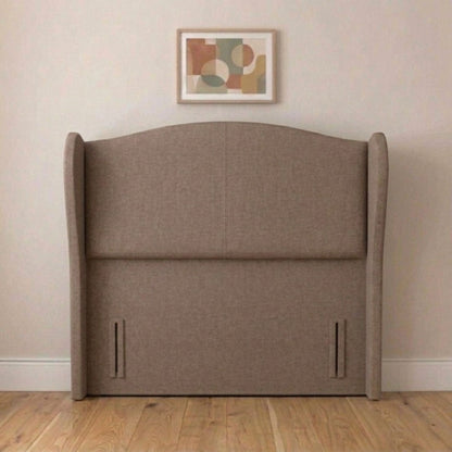 Modern wingback headboard fixed to a divan base